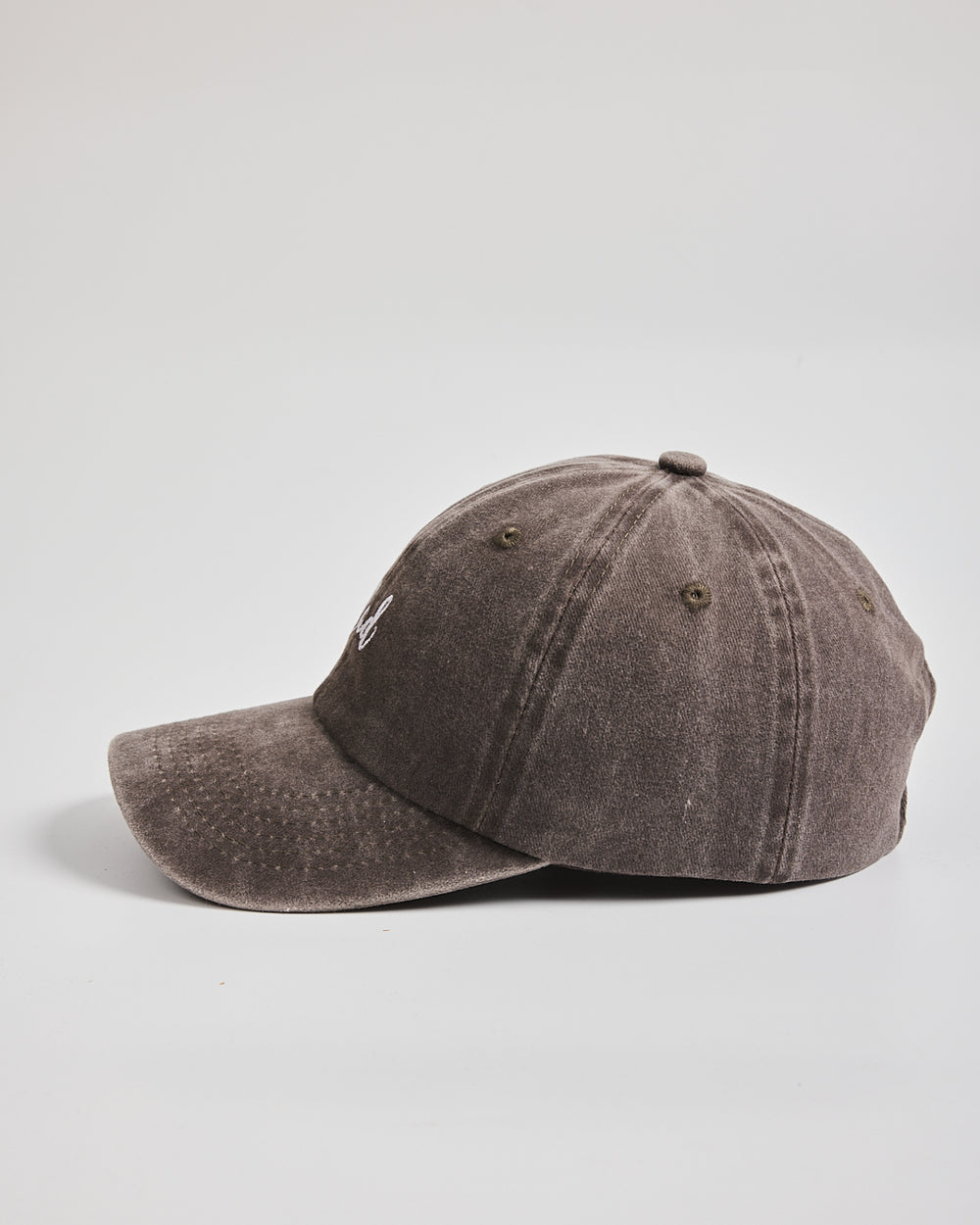 Dad Brown Washed Cap on a light gray background