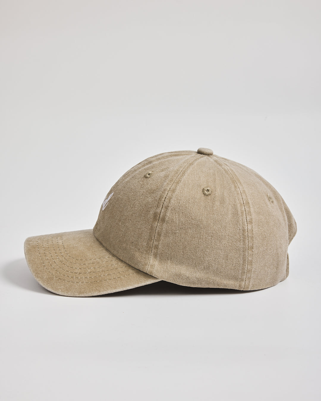 Dad Cream Washed Caps on a light gray background