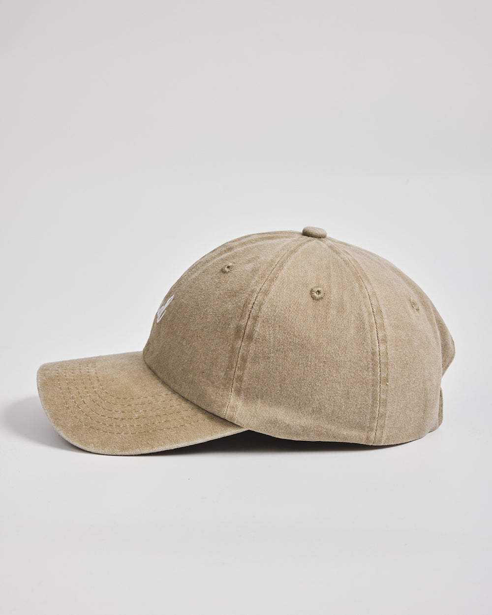 Dad Cream Washed Caps on a light gray background