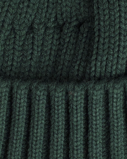 close look of dark green fisherman beanie 