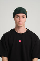 front view of a man Dark Green Fisherman Beanie