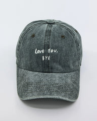 Dark Green Washed Cap with 'Love You, Bye' embroidered in white.