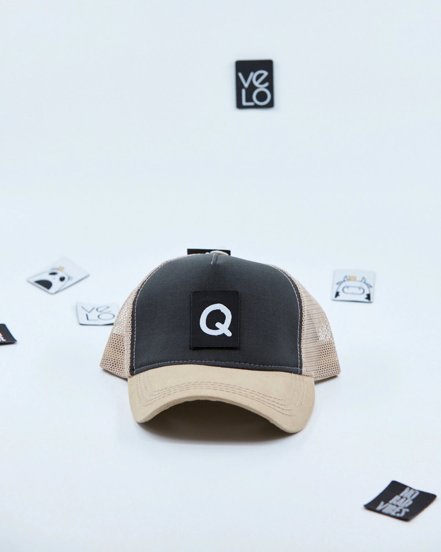 Front view of Dark Grey and Beige Trucker Cap