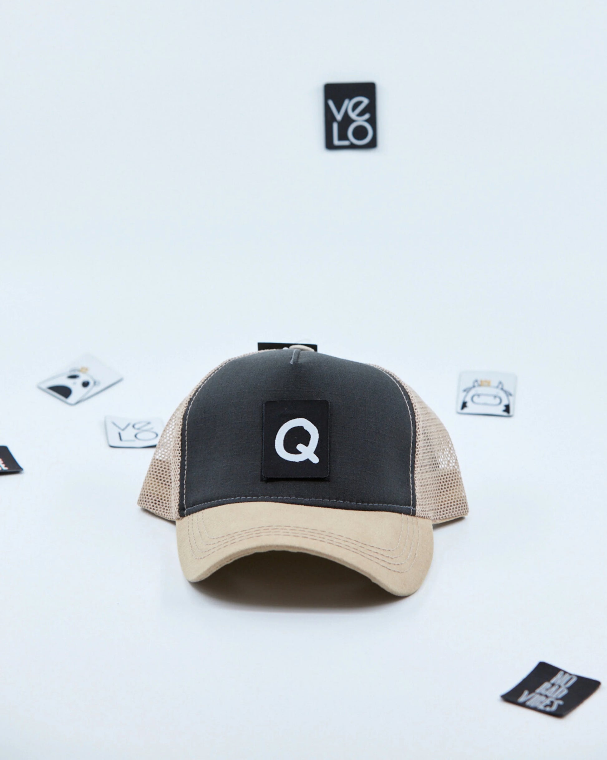 Front view of Dark Grey and Beige Trucker Cap