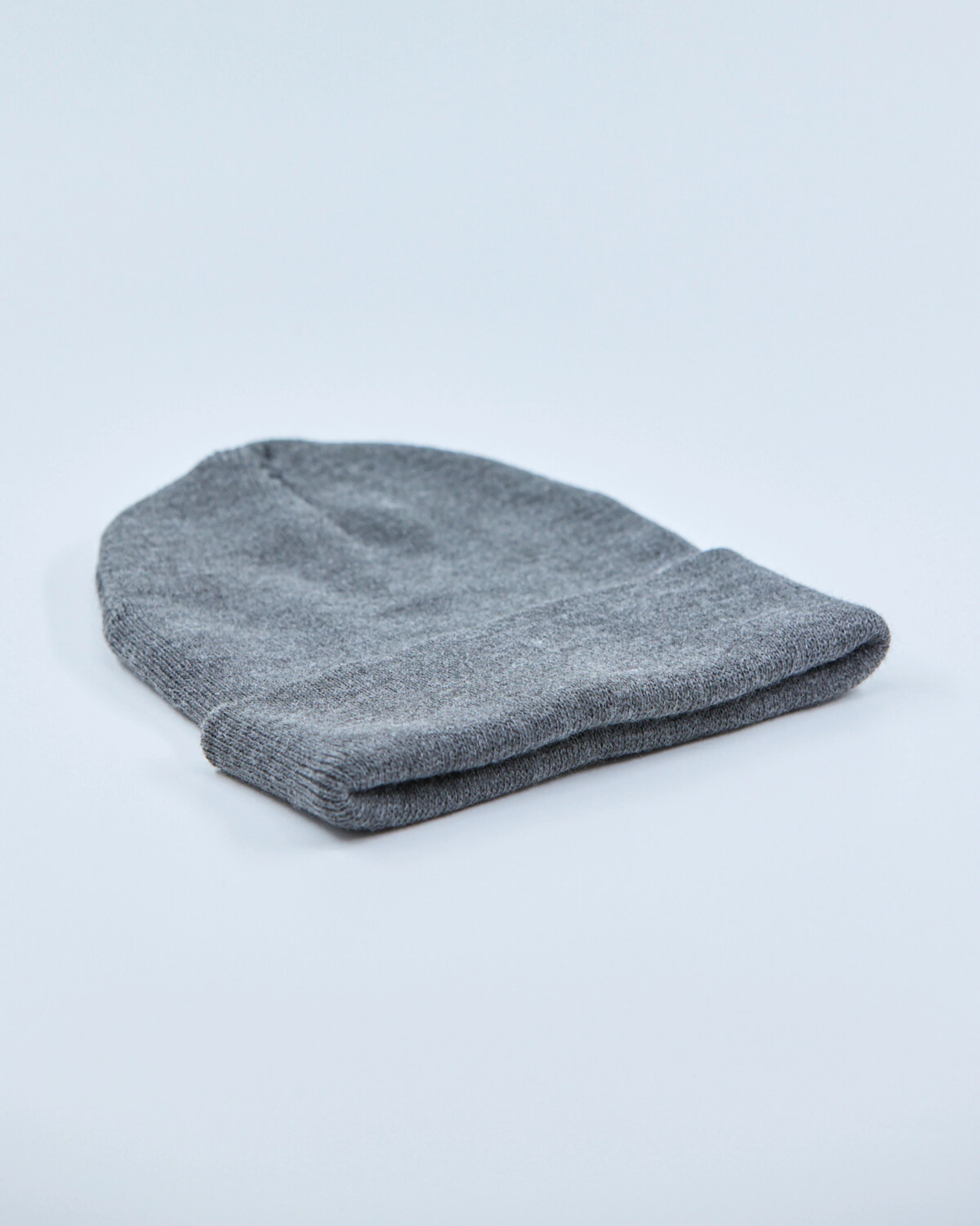 Gray beanie on a light gray background