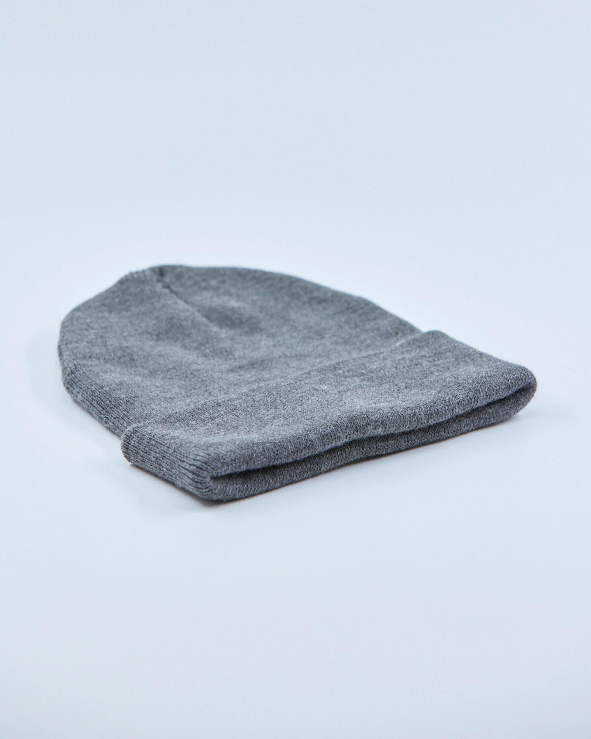 Gray beanie on a light gray background