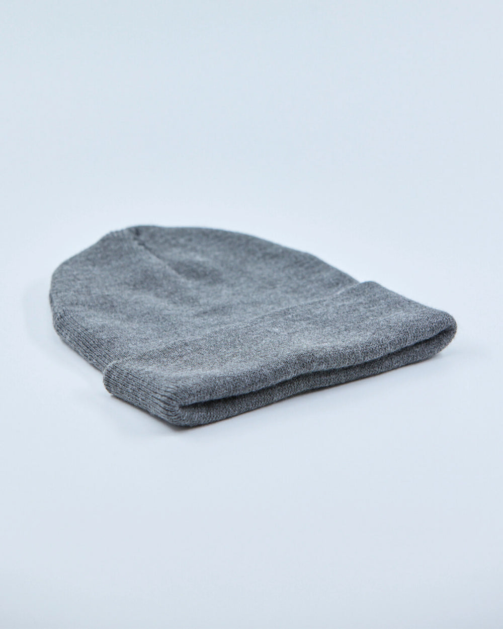 Gray beanie on a light gray background