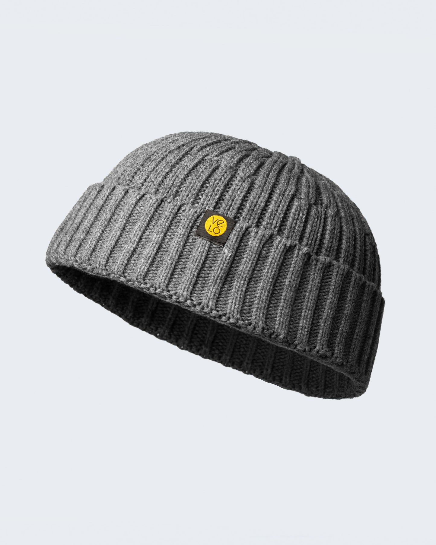 dark grey fisherman beanie on a white background
