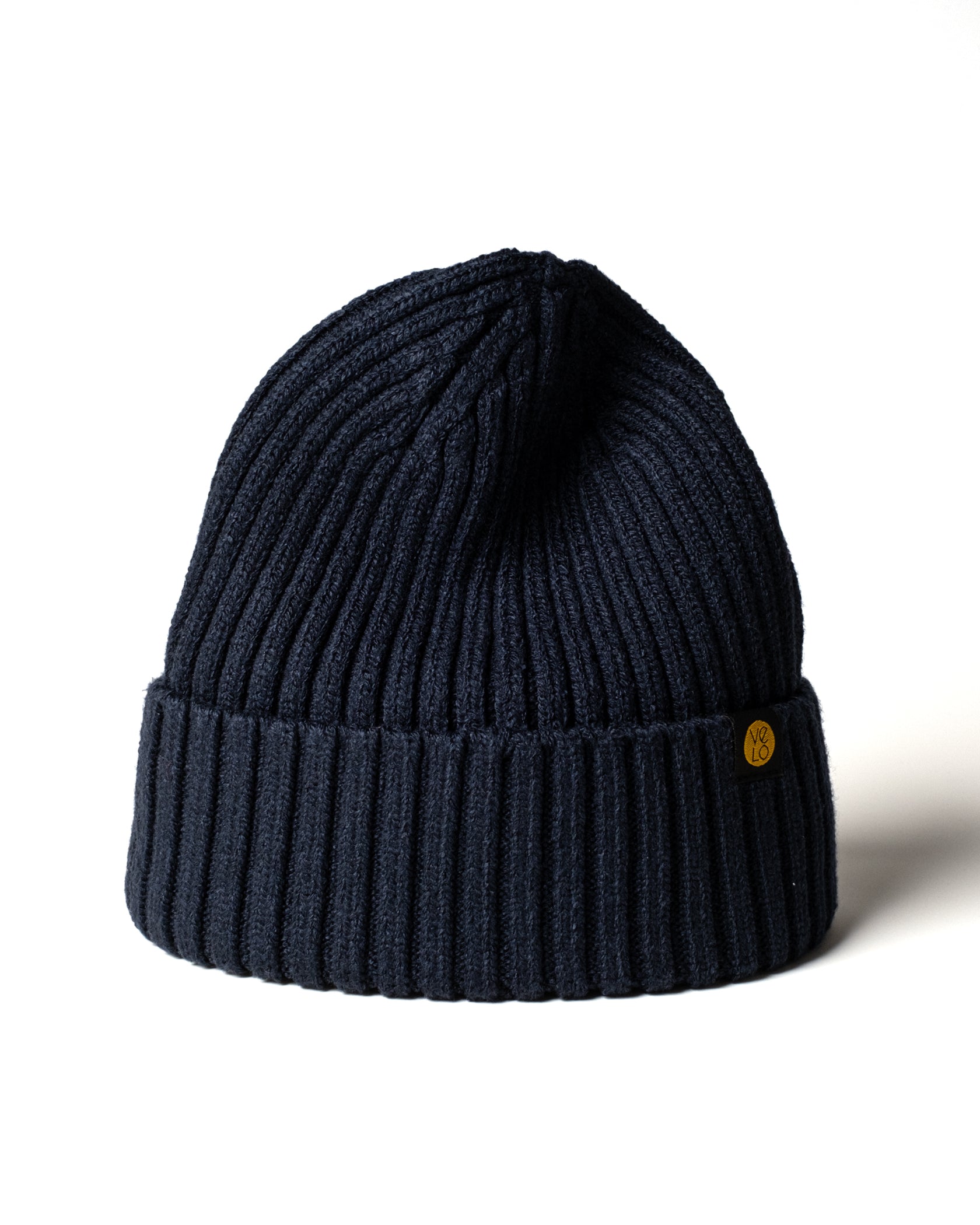 Dark Navy Classic Beanie with a brand logo on a white background