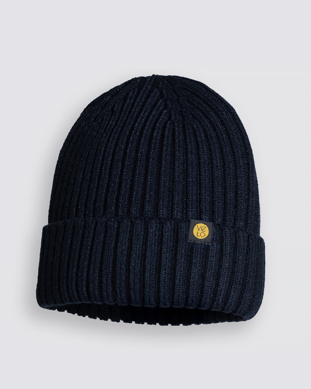 Dark Navy Classic Beanie with a logo on a light gray background