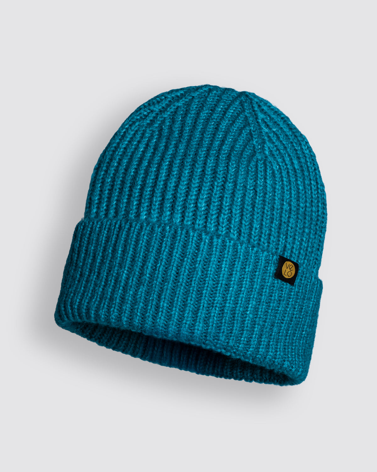 Front view of Dark Turquoise Lux Beanie