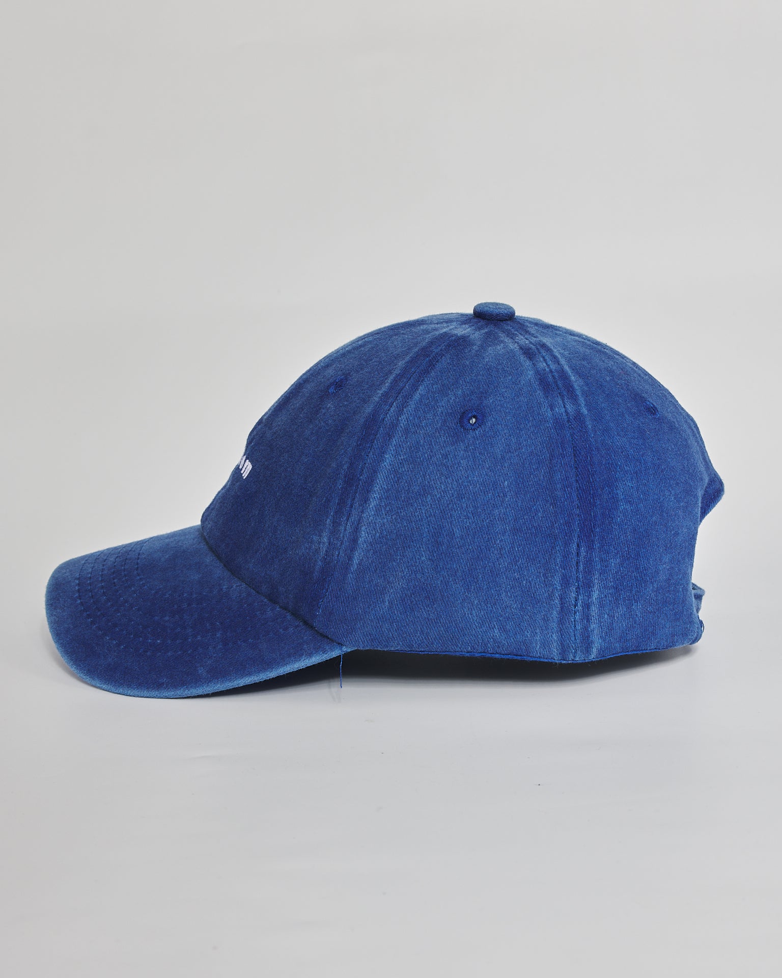 Dog Mom royal blue washed cap - angled view