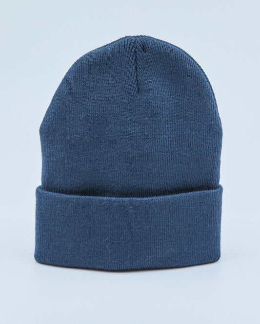 Dusty navy blue beanie on a light blue background