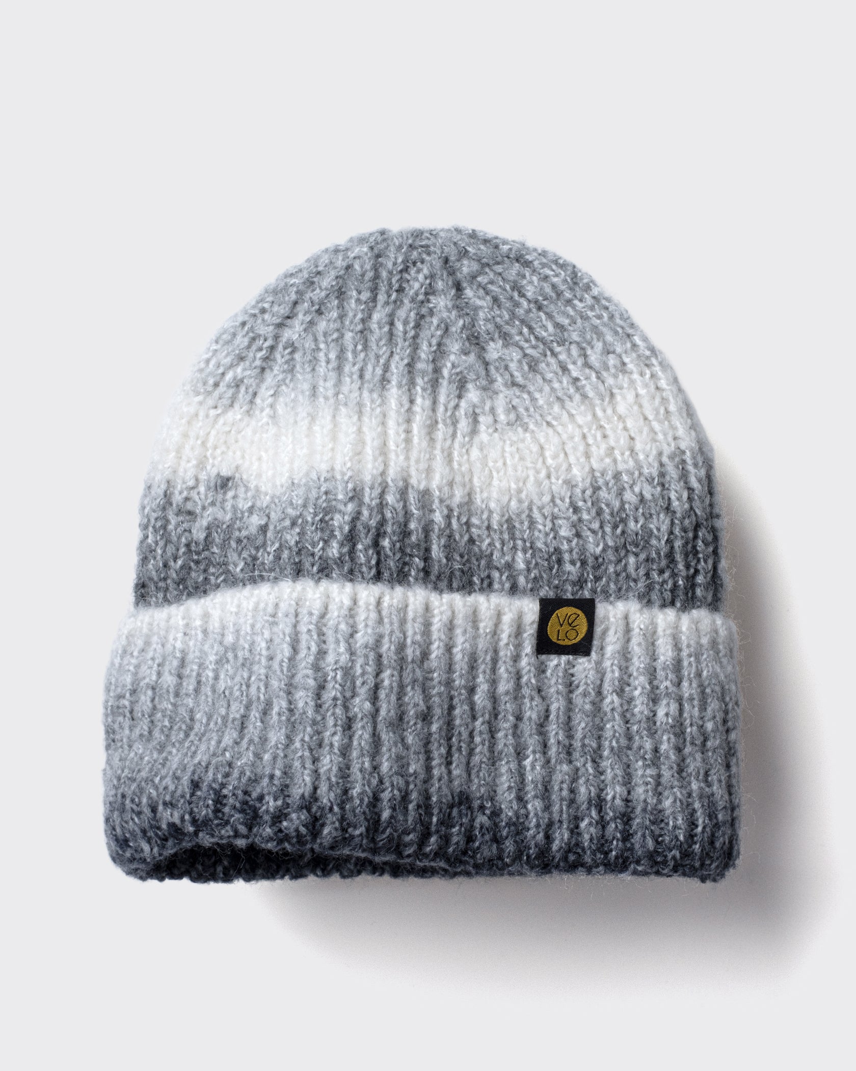 Faded Grey Lux Beanie on a light gray background