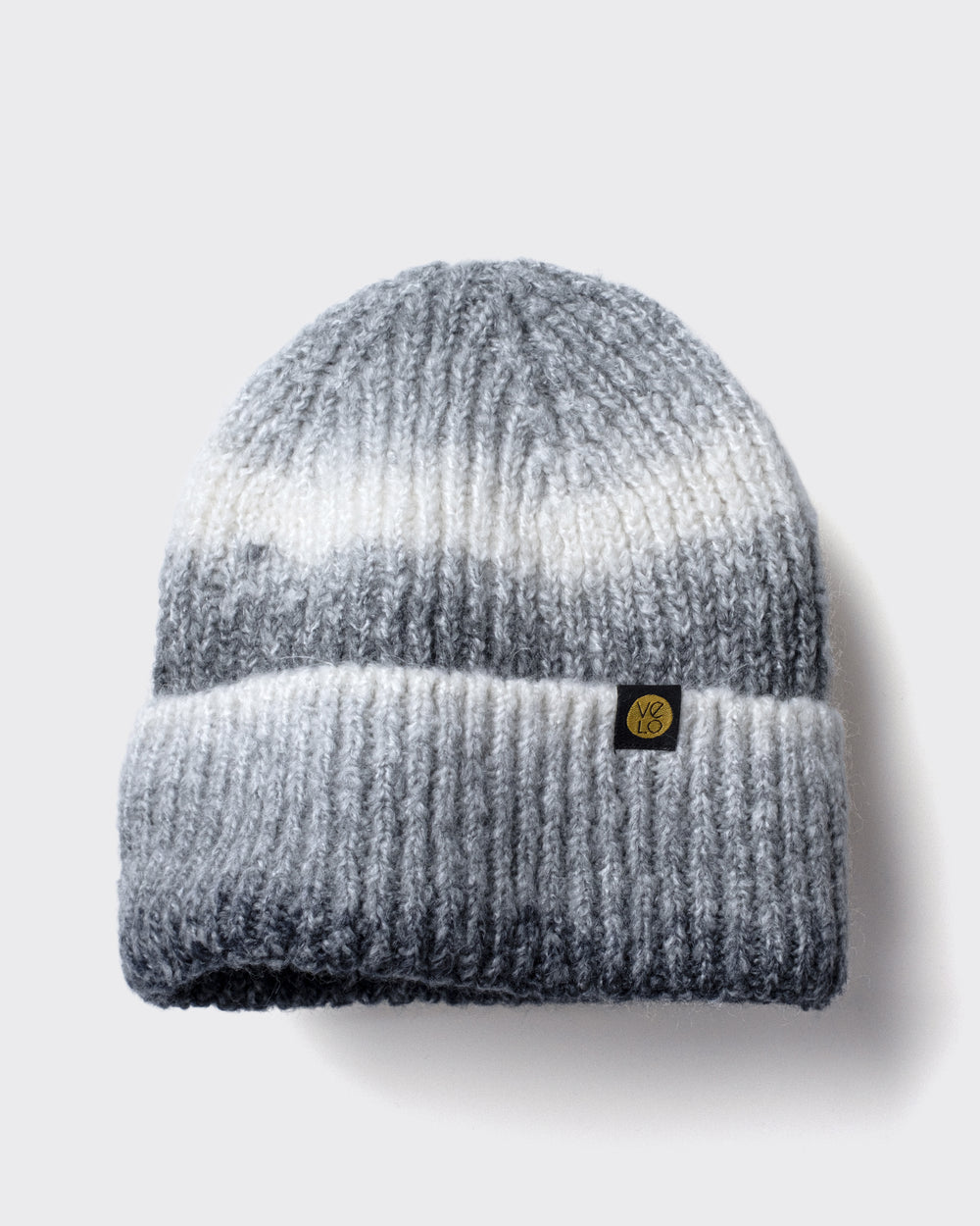 Faded Grey Lux Beanie on a light gray background