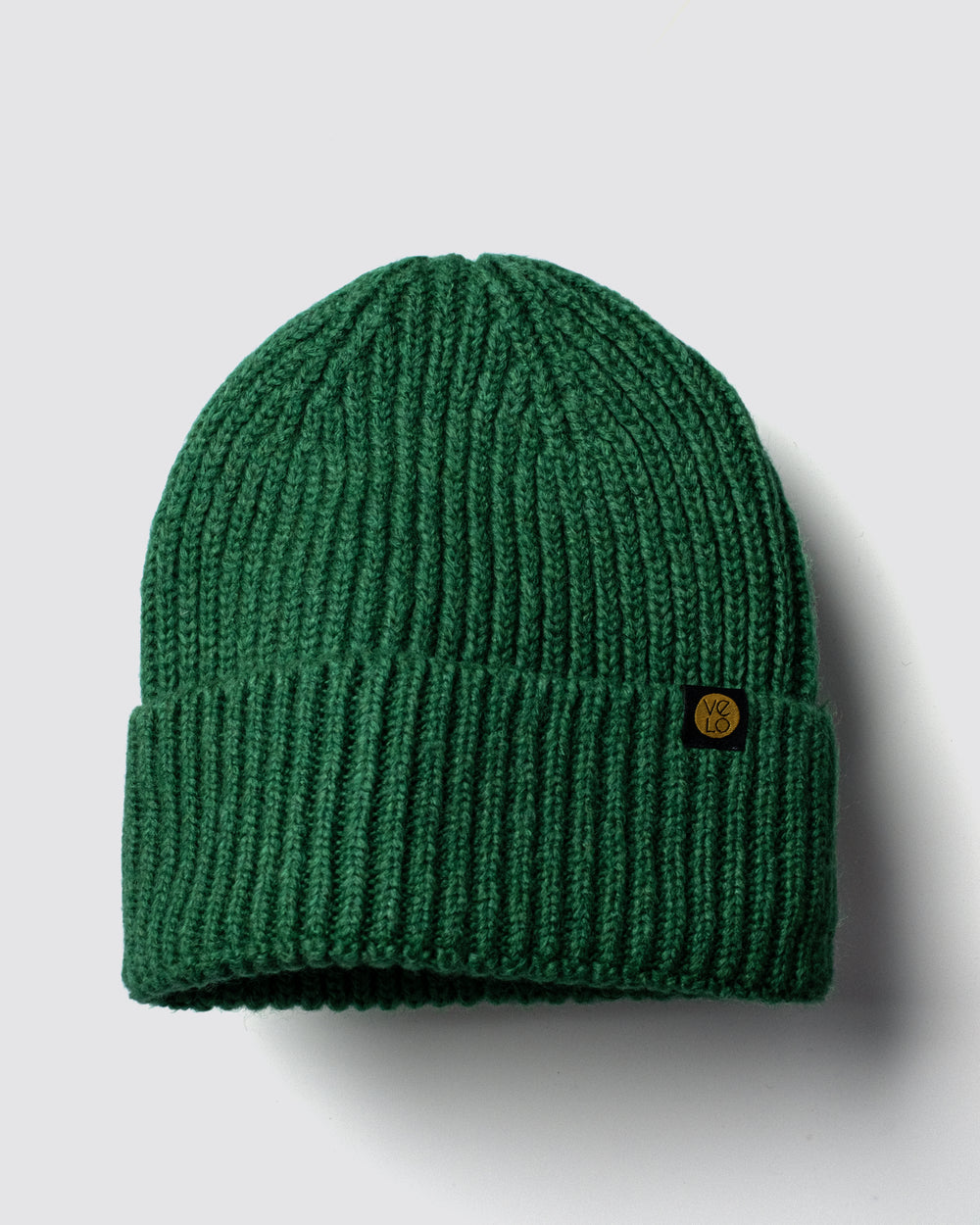 Forest Green Lux Beanie on a light gray background