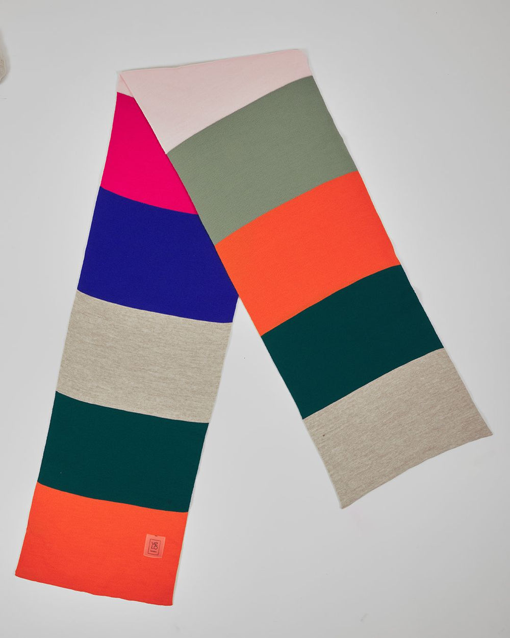 Funk Static unisex acrylic scarf flat lay in hot pink, cobalt blue, coral orange, deep teal, sage and cream