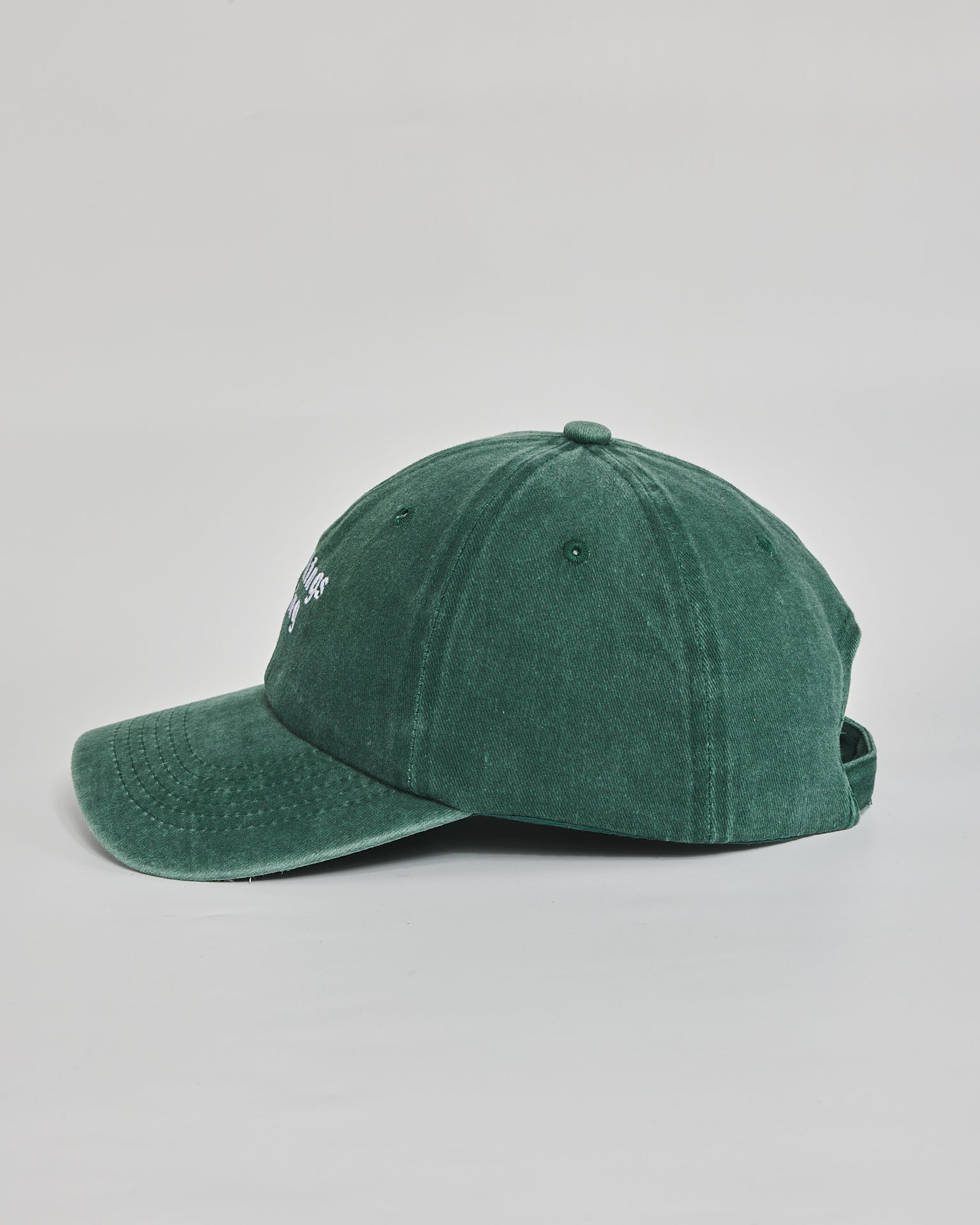 Good Things Coming forest green washed cap - angled view