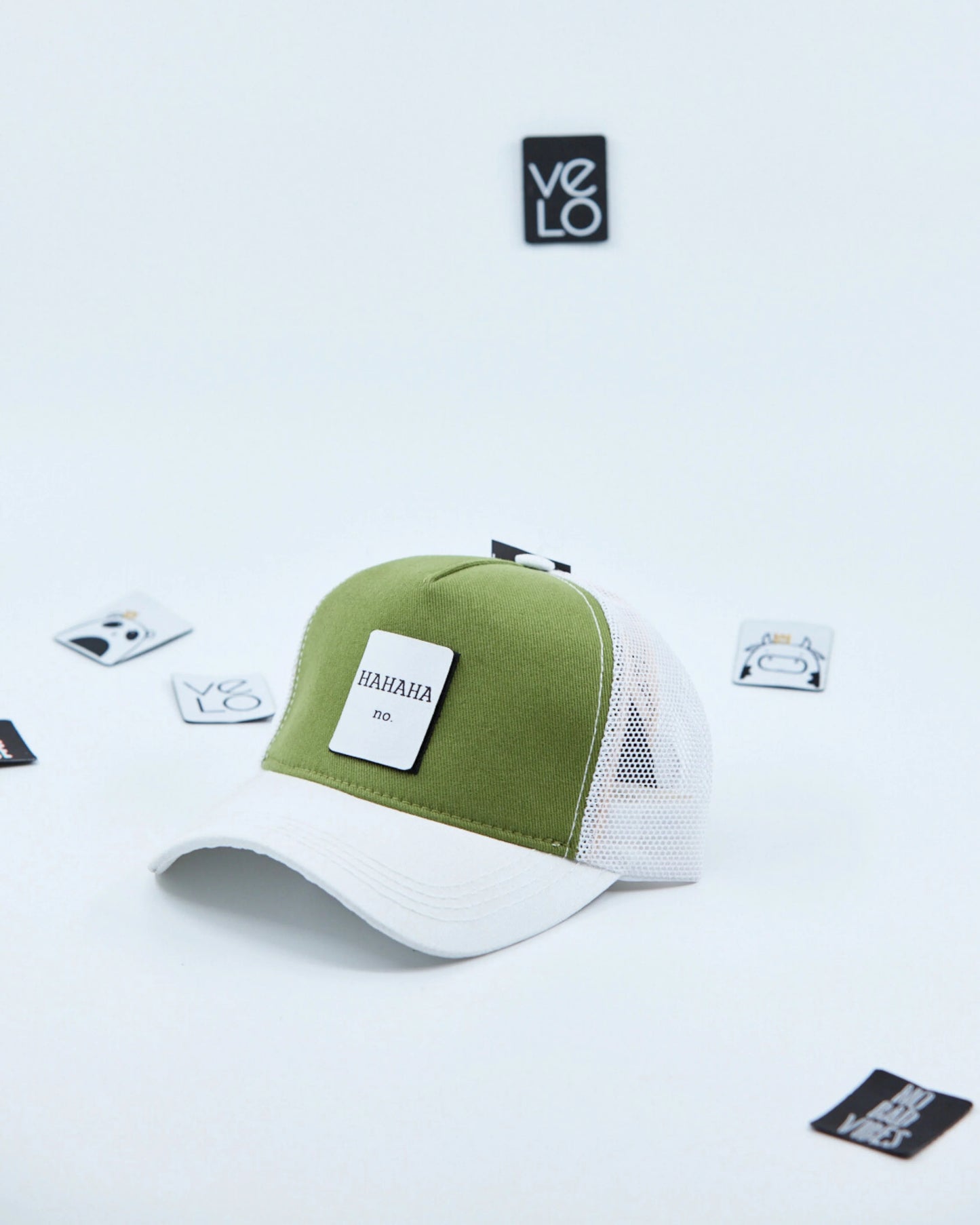 Side view of Green and White Trucker Cap with patches