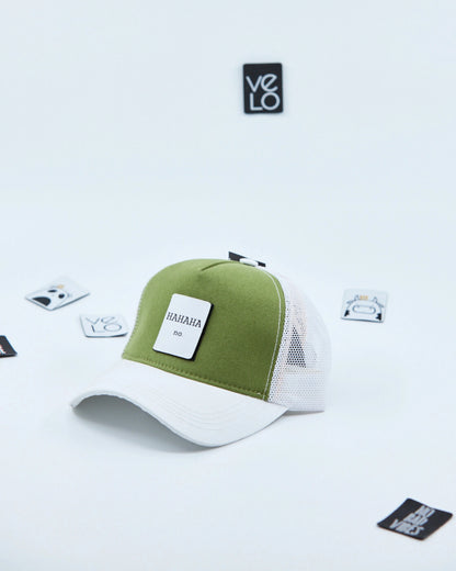 Side view of Green and White Trucker Cap with patches