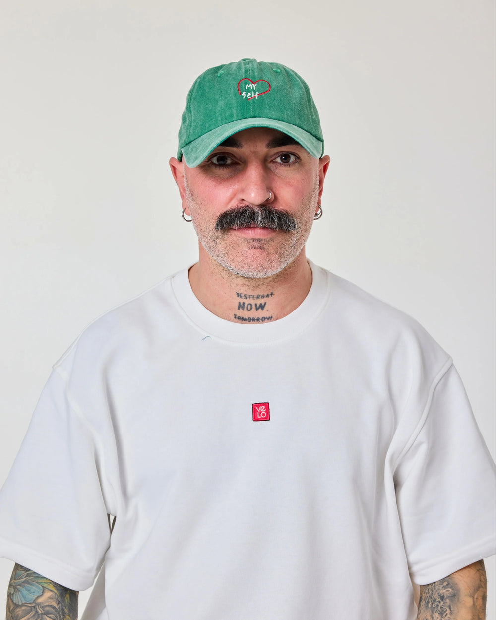 man wearing Green Love Myself Washed Cap