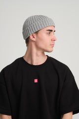 side view of a man wearing Grey Fisherman Beanie