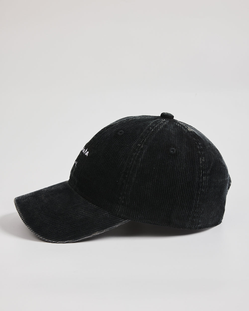 Black cap on a light gray background