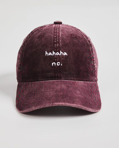 Hahaha No Burgundy Corduroy Cap with 'hahaha no.' text on a light gray background