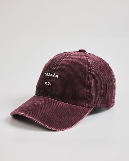 Hahaha No Burgundy Corduroy Cap with white text on a light gray background