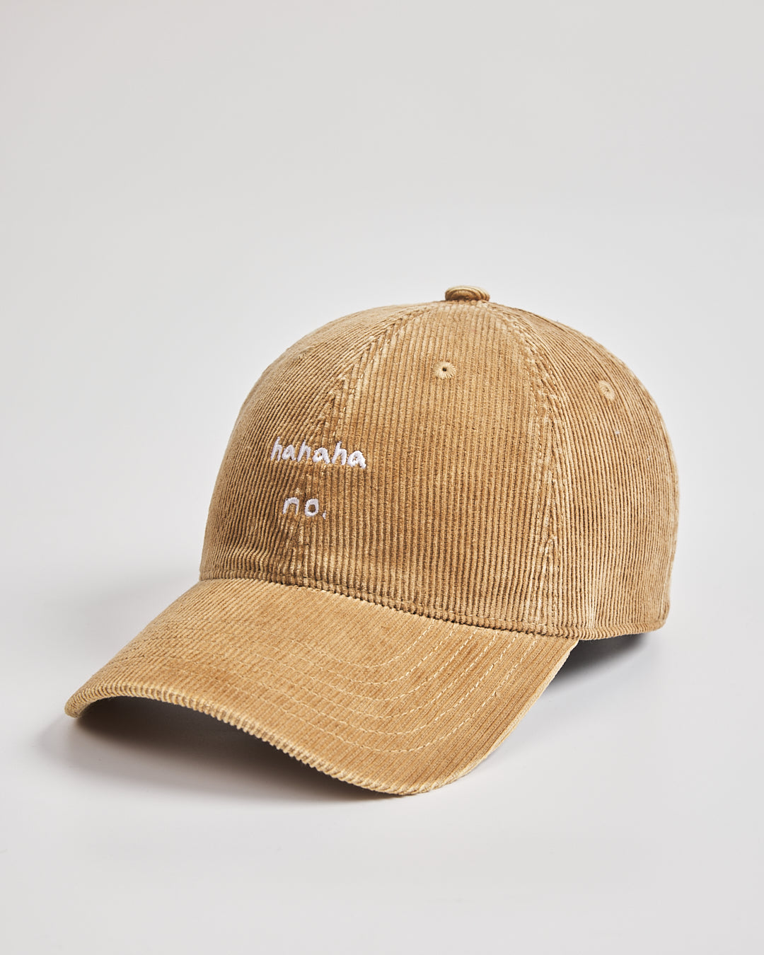 Hahaha No Camel Corduroy Cap with white text on a light gray background