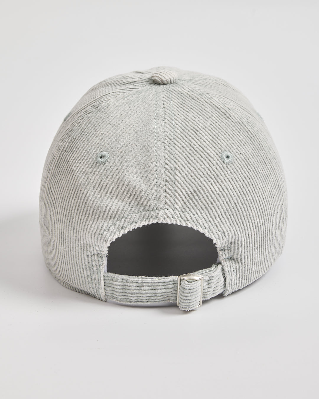 Gray corduroy cap on a light gray background