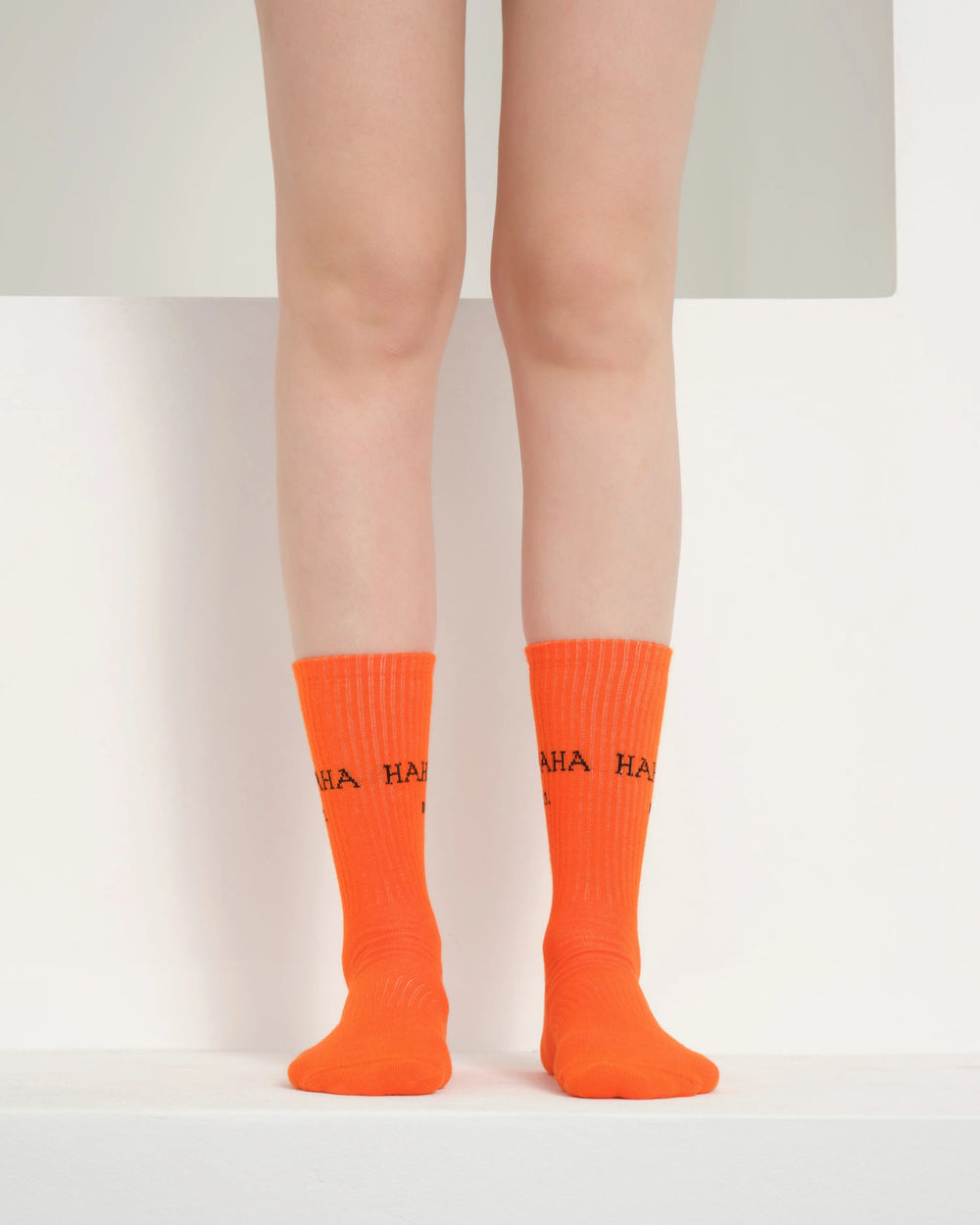front view of orange hahaha no socks