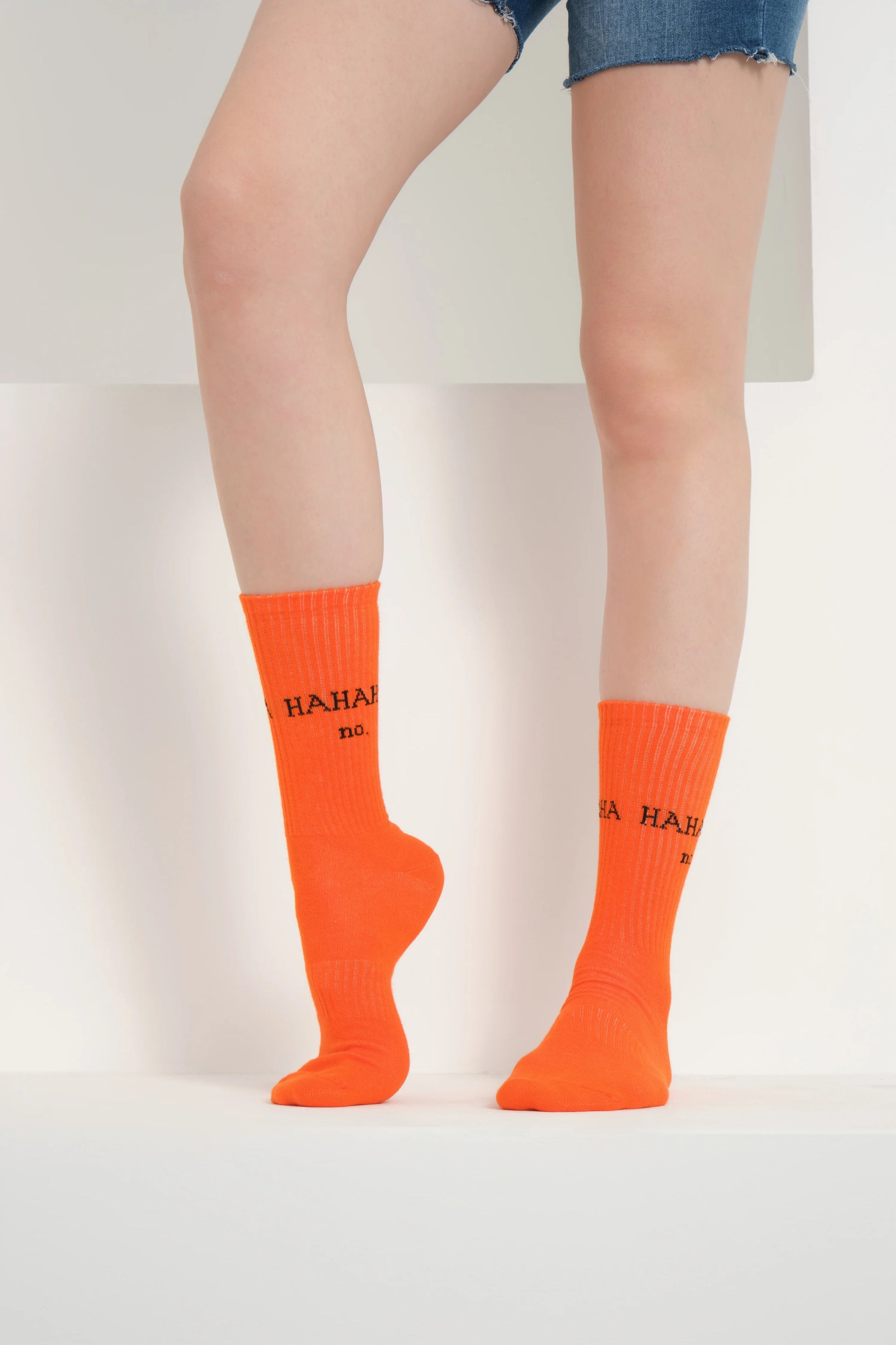 side view of orange hahaha no socks