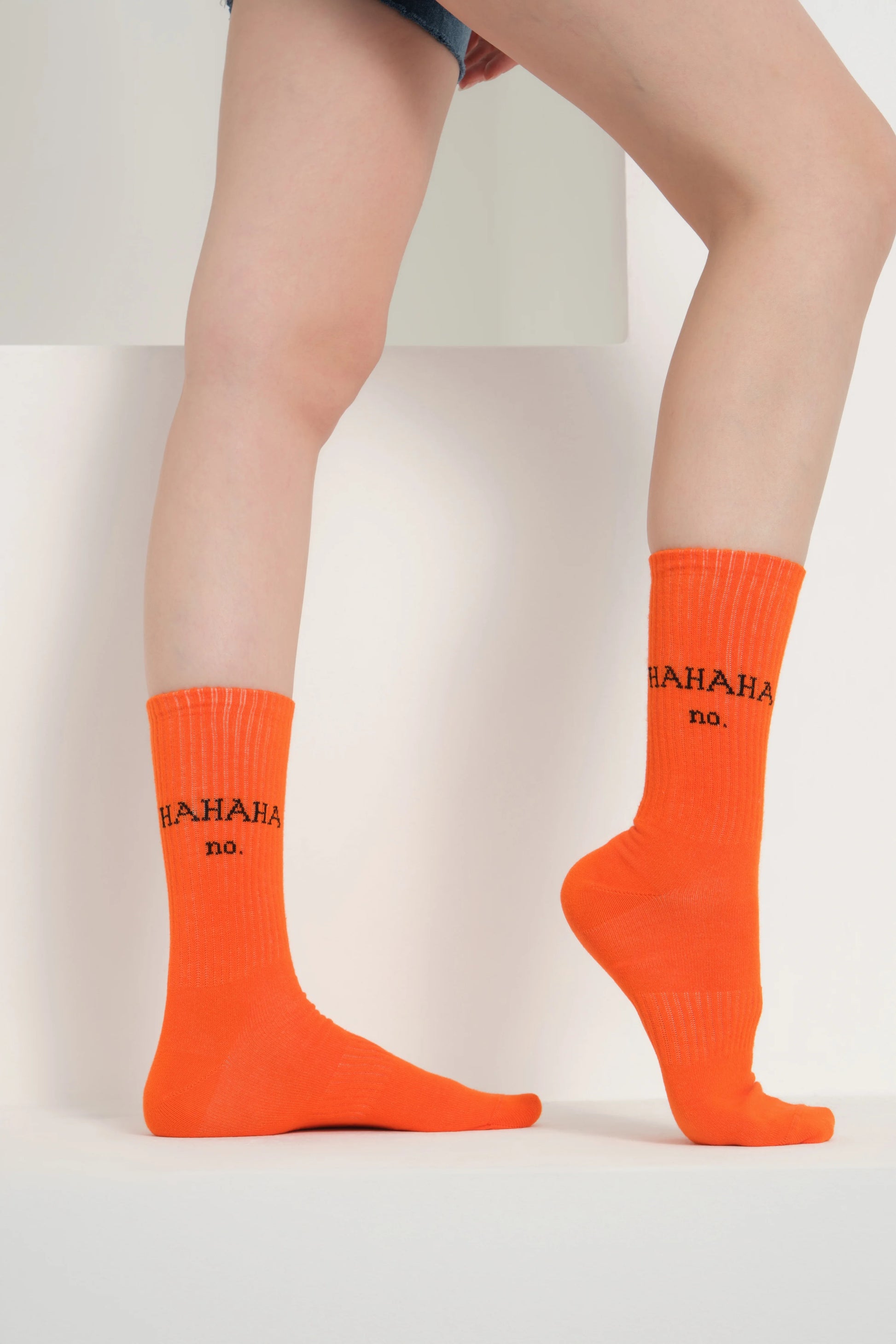 side view of orange hahaha no socks
