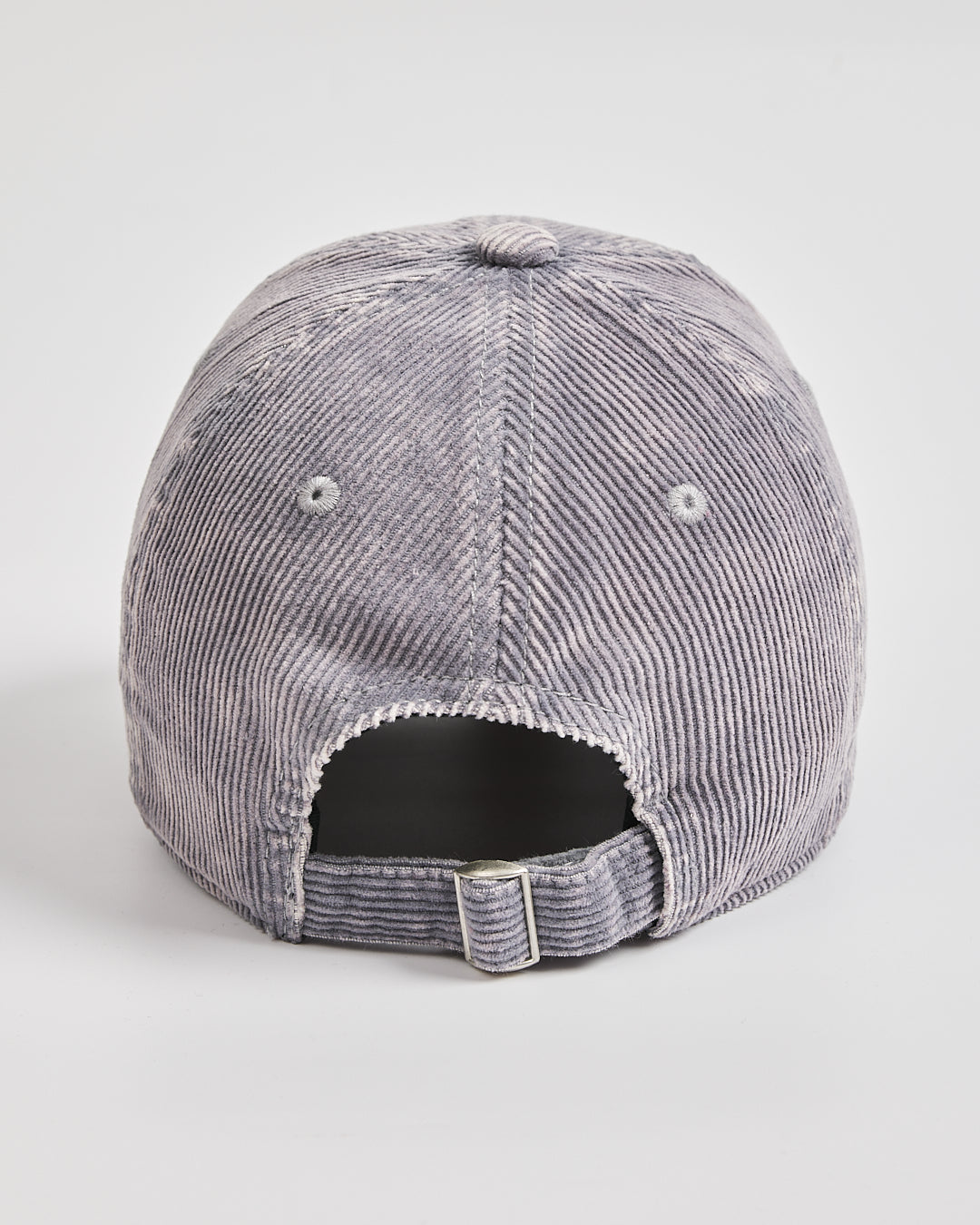 Gray corduroy cap on a light gray background
