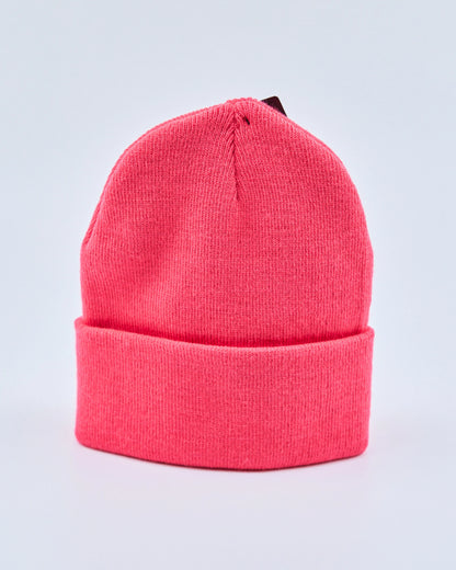 Hot pink beanie on a light gray background