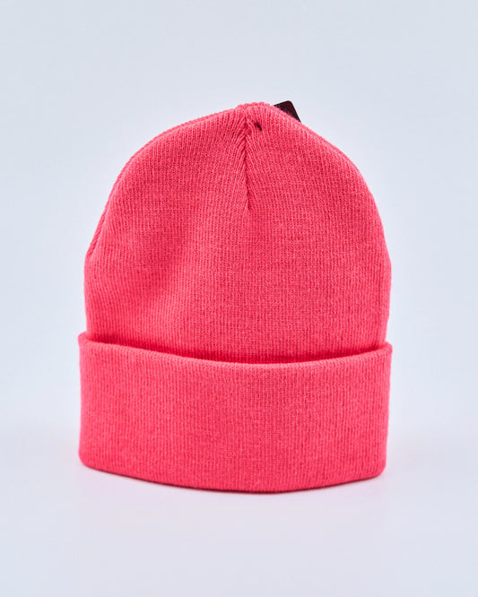 Hot pink beanie on a light gray background