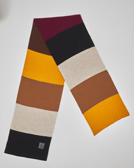 Jazz Roast unisex acrylic scarf flat lay in mustard, burgundy, black, cream and roasted brown