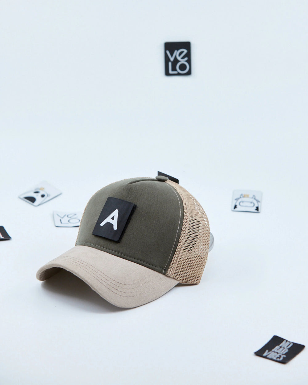 Side view of Khaki and Beige Customisable Trucker Cap with patches