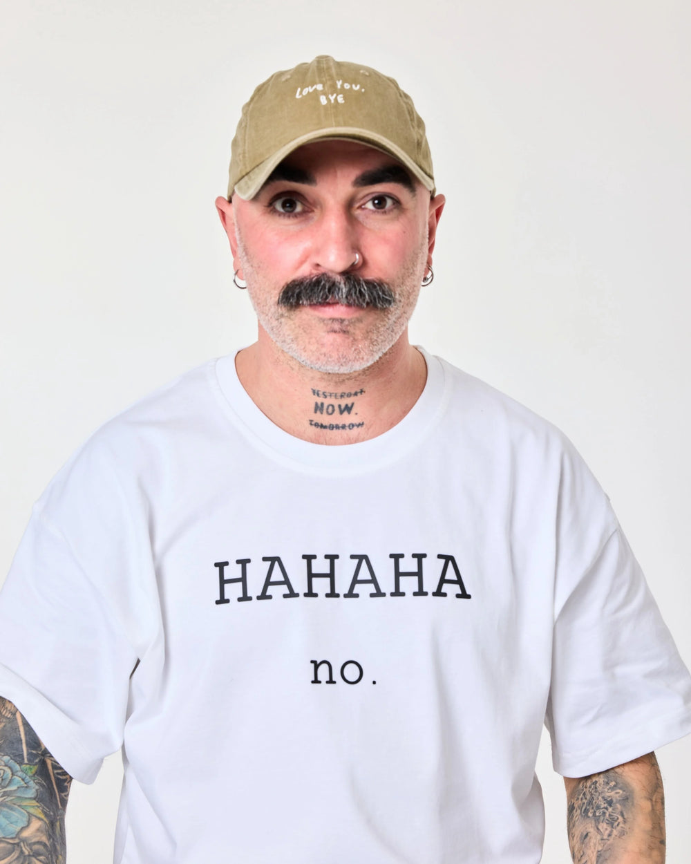 front view of a man wearing Love You Bye Khaki Washed Cap