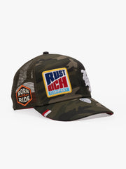 Camouflage cap with visible branding on a white background