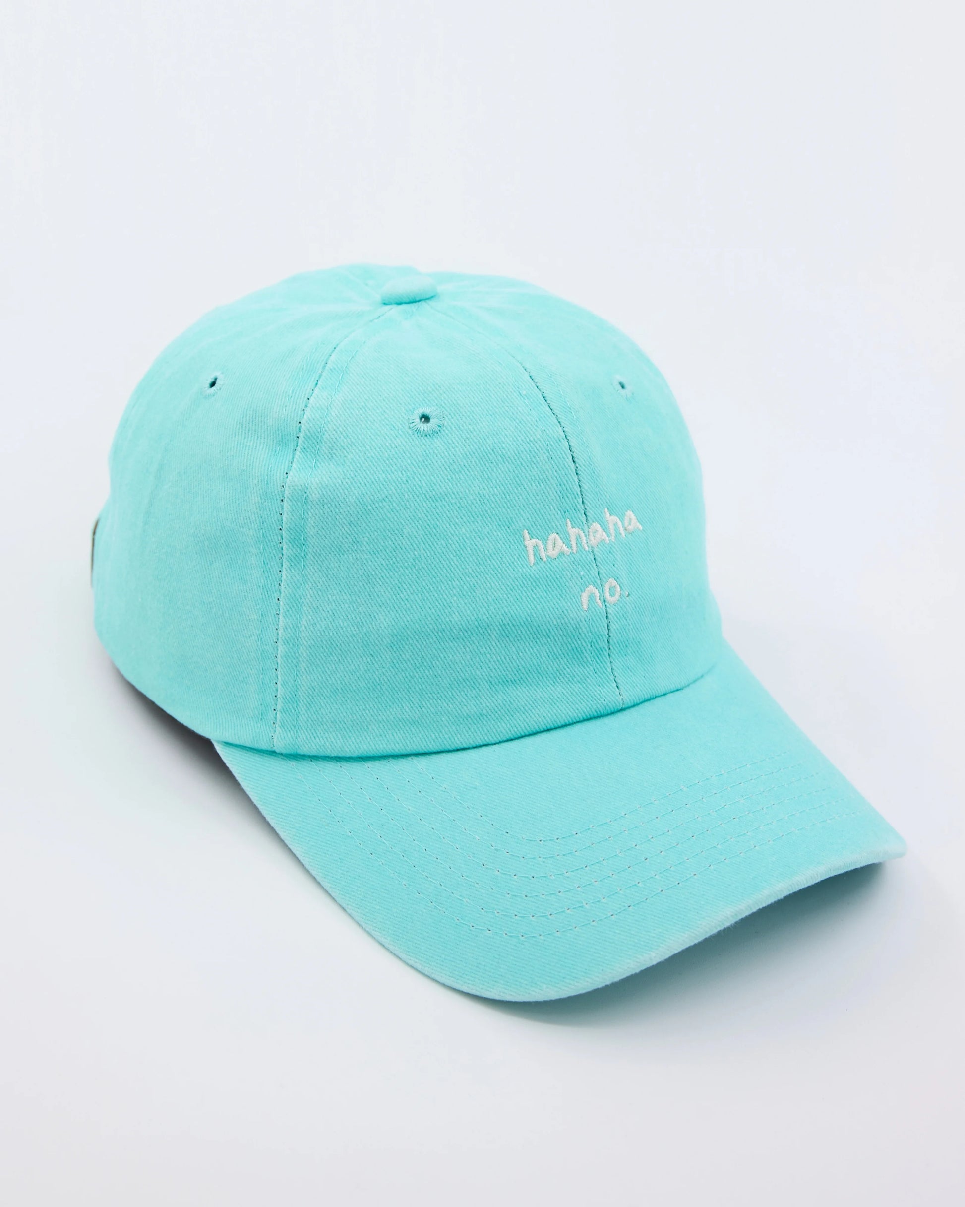 side view of Hahaha No Light Blue Washed Cap