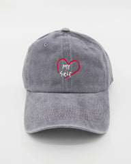 front view of Light Gray Washed Cap with Love Myself embroidered in white 