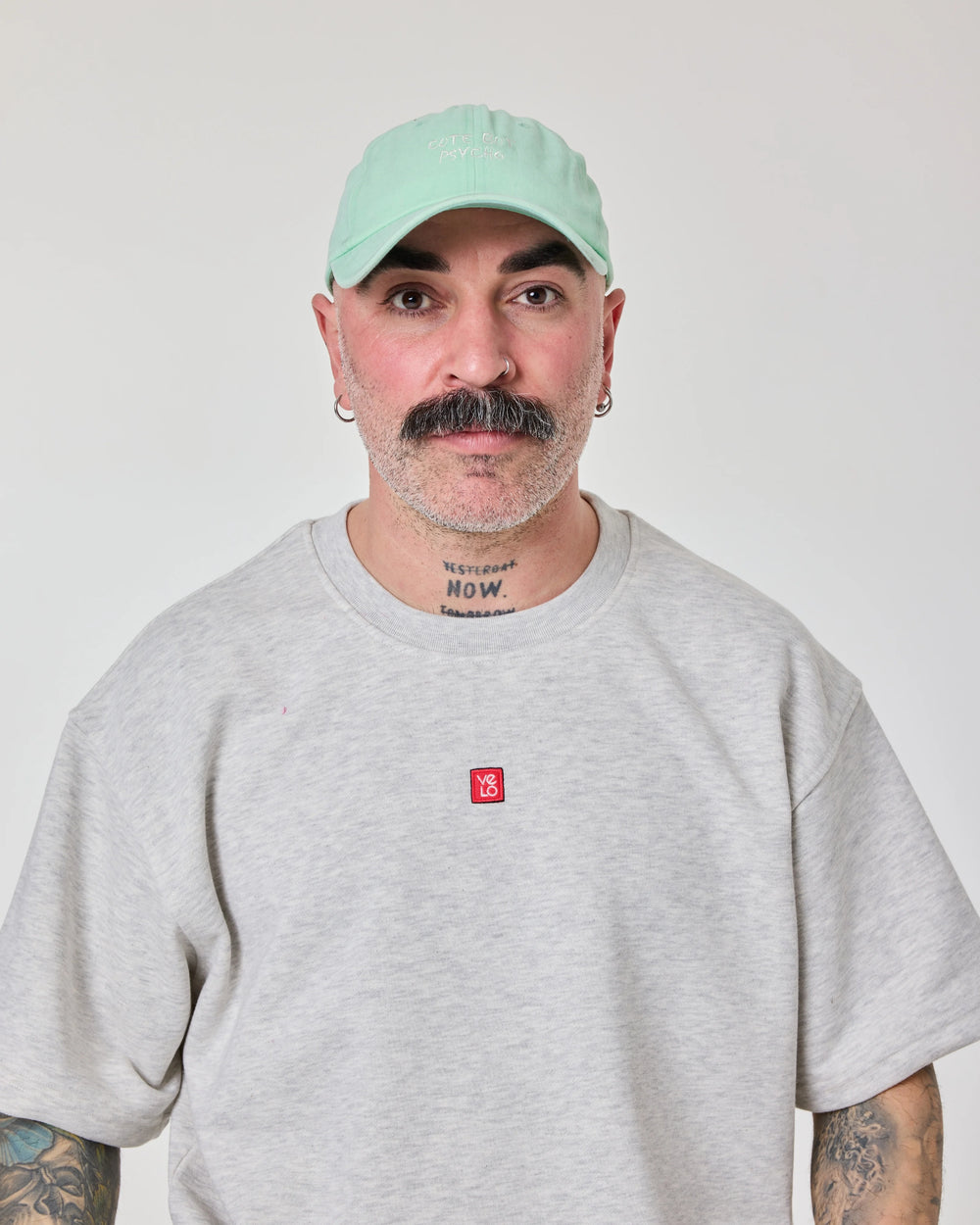 man wearing Cute But Psycho Light Green Cap Hat