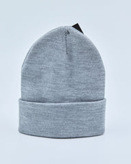 Light gray beanie on a light blue background