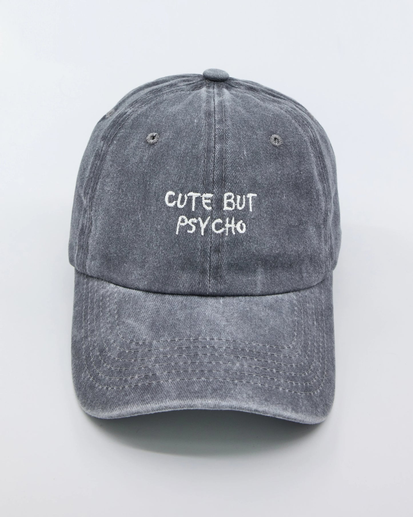 front view of Cute But Psycho Light Grey Washed Cap