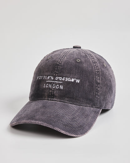 Gray corduroy cap with 'London' and coordinates on a light gray background