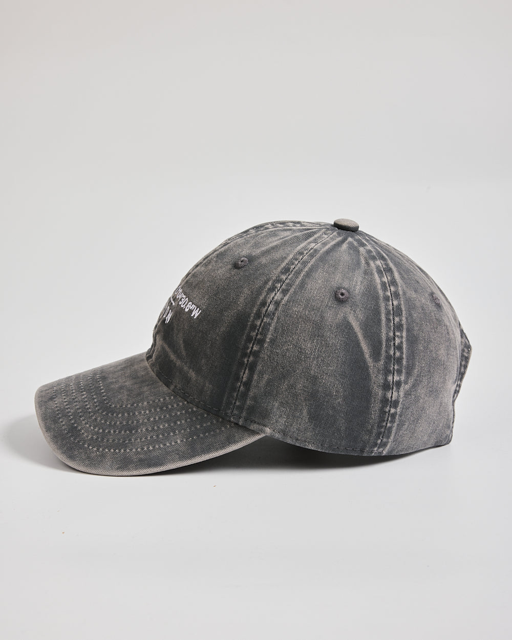 London Light Washed Stone Washed Cap on a light gray background