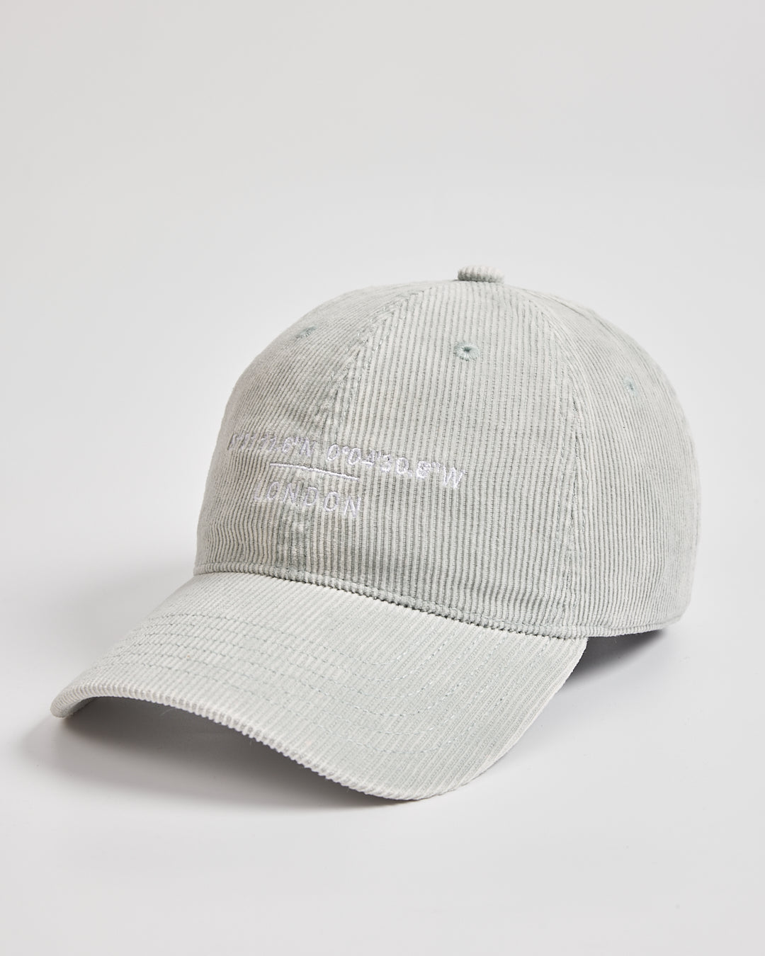 Gray corduroy cap on a light gray background