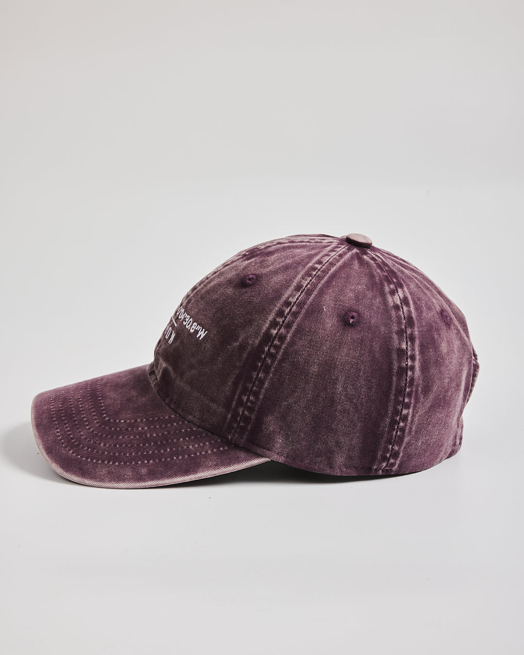 London Plum Washed Cap on a light gray background